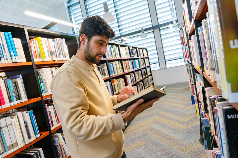 Student reading book